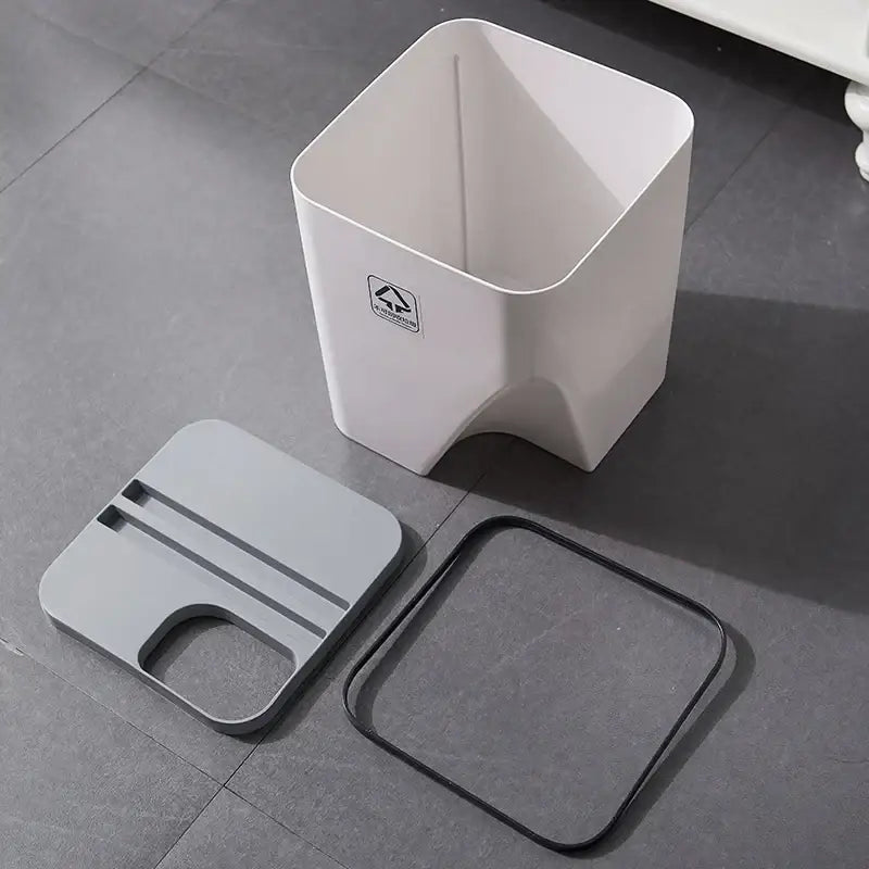 White square decorbites stackable trash bin with gray lid and black wire frame for kitchen recycling