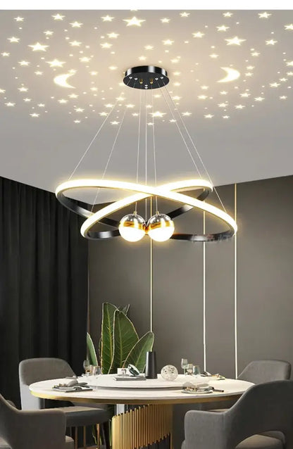Modern black and gold led chandelier with intertwined rings and spherical bulbs for living room starry sky decor