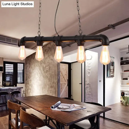 Industrial-style black pipe pendant light with four exposed led incandescent filament bulbs for dining room use