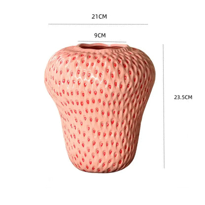 Pink ceramic vase with textured strawberry cartoon ceramic design and small red dots for kids room decor