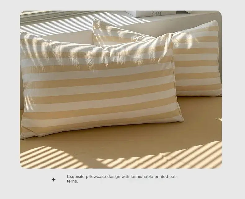 Cream and gold striped pillowcases with a soft satin finish from decorbites™ striped quilt set and bed sheet