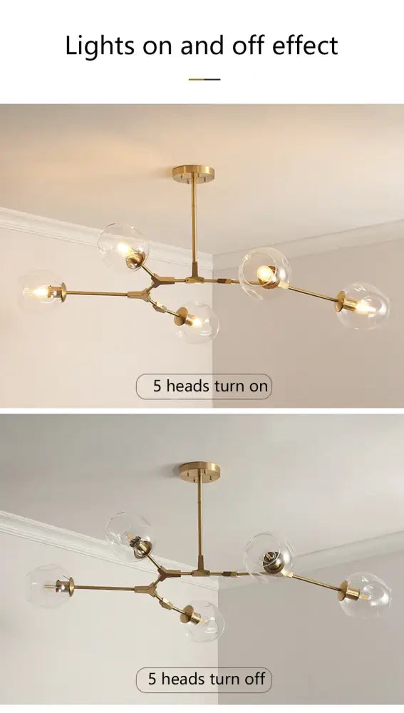 Gold-toned modern chandelier lighting with five clear glass globes for dining and living rooms by DecorBites