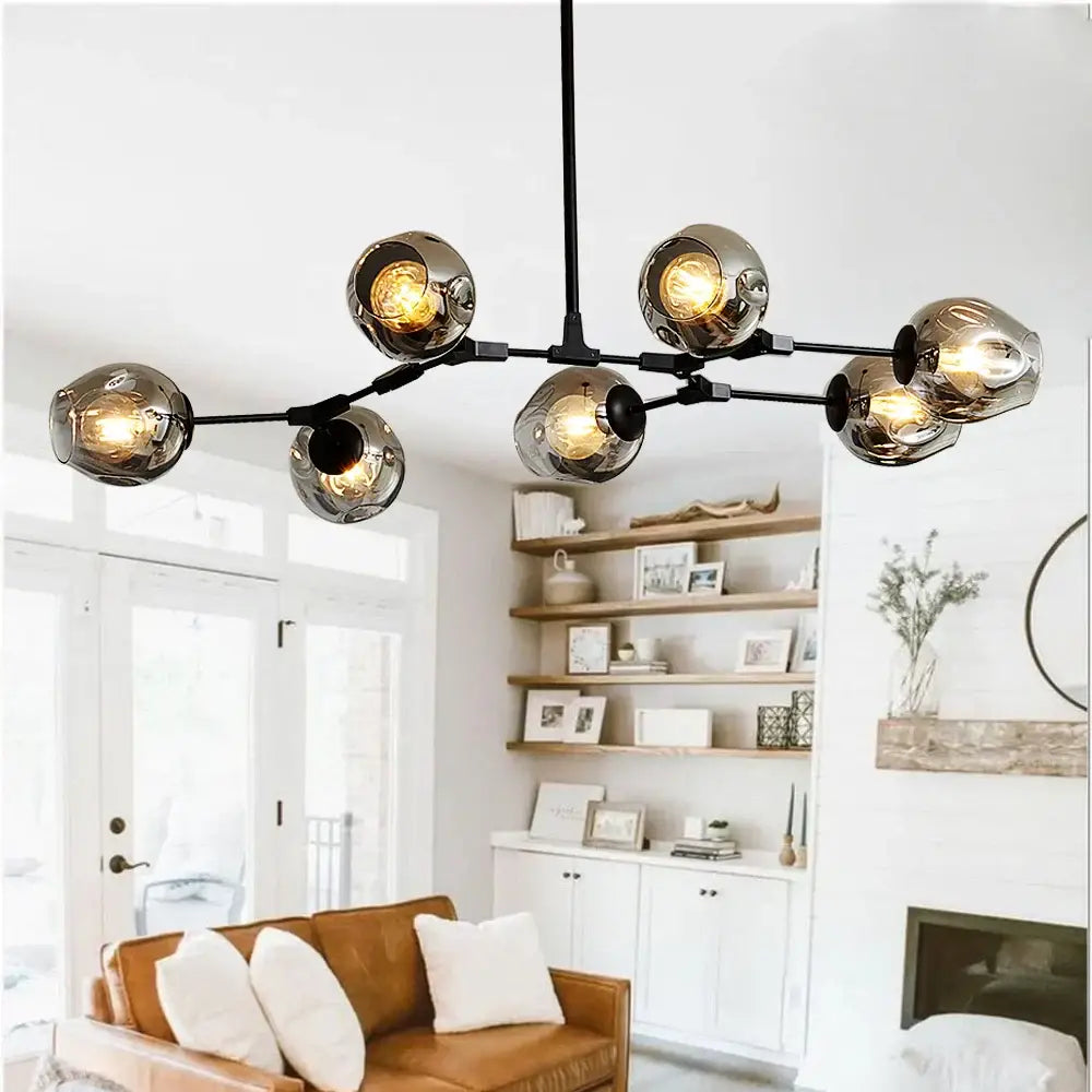 Modern chandelier lighting by DecorBites featuring black metal frame and seven frosted glass globes for dining and living rooms