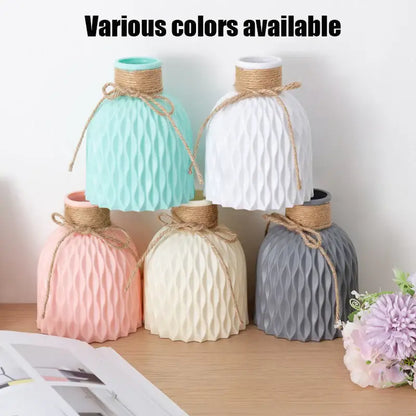 Pastel-colored ceramic stylish nordic color block vase with ribbed texture and natural twine tie for modern flower display