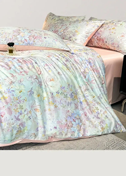 Decorbites summer floral satin silk duvet cover set with pastel mint and blush pink hues and embroidered blossoms