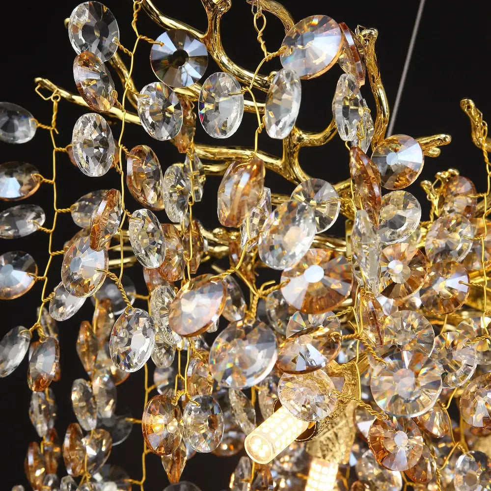 Gold-toned decorbites™ sunflower crystal chandelier with cascading clear and amber crystals for dining room use