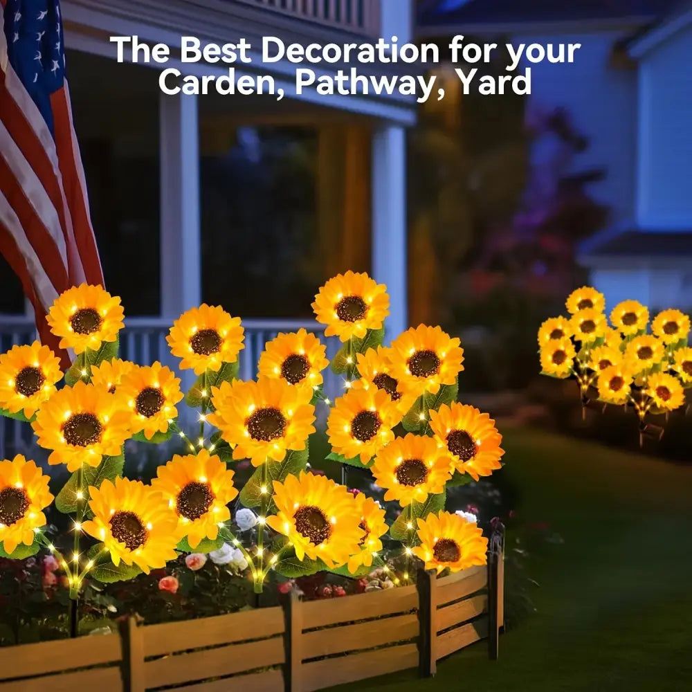 Decorbites™ sunflower solar led garden light with auto brightness in bright yellow with green stems in wooden planter box