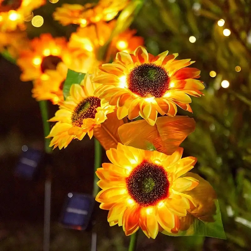 Decorbites™ sunflower solar led garden light with auto brightness features bright yellow fabric petals and glowing centers