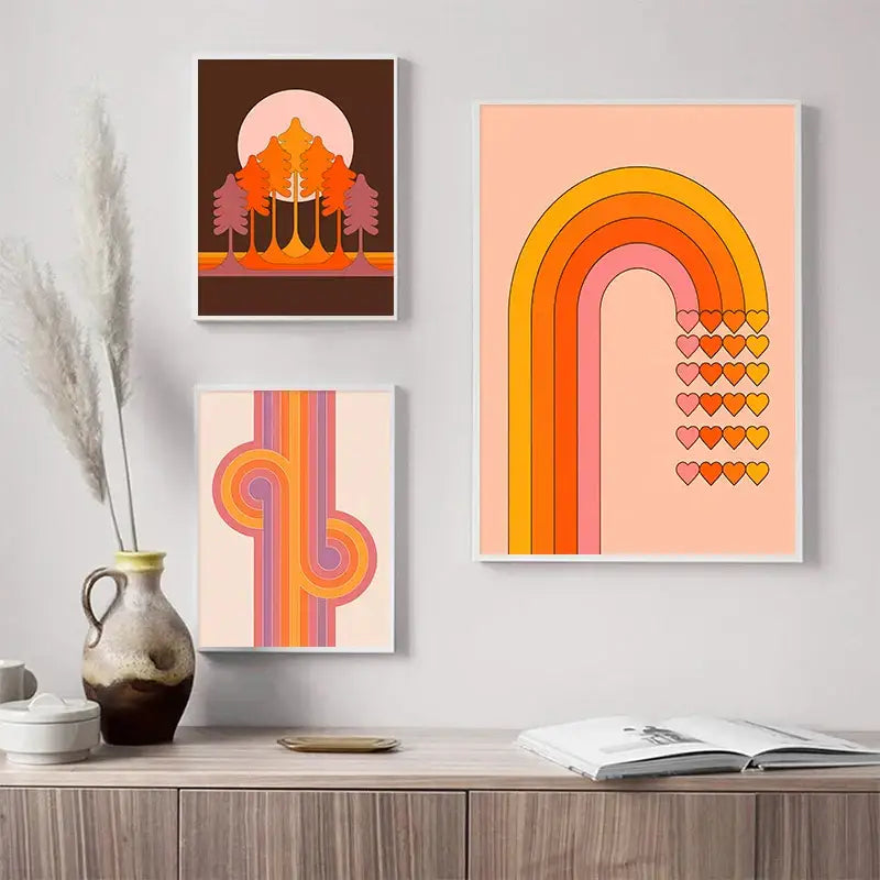Three framed vintage-style decorbites™ sunset rainbow flower prints canvas with retro colors hang above wooden cabinet