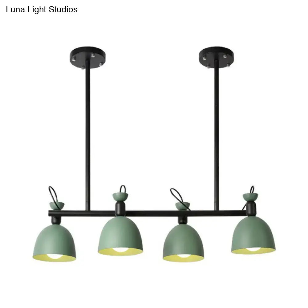 Modern industrial pendant light fixture with four matte sage green dome shades and black metal arms for dining room 110v-120v light type
