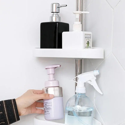 White plastic corner shelf with two tiers holding bathroom products in rust-proof stainless steel telescopic shower rack organizer