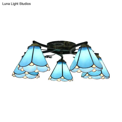Blue tiffany stained glass ceiling light fixture with five bell-shaped shades in antique bronze for bedroom decor