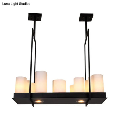 Black metal island pendant light with traditional barrel frosted glass candle-style shades for dining room