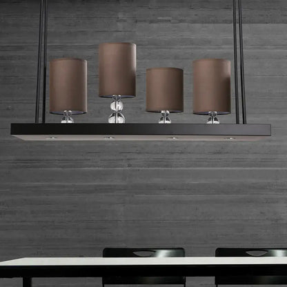 DecorBites traditional black cylinder island light fixture with four brown fabric shades and clear glass accents