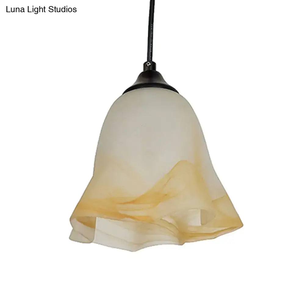 DecorBites traditional glass pendant light with flower cone shape frosted amber swirls and black metal for living room
