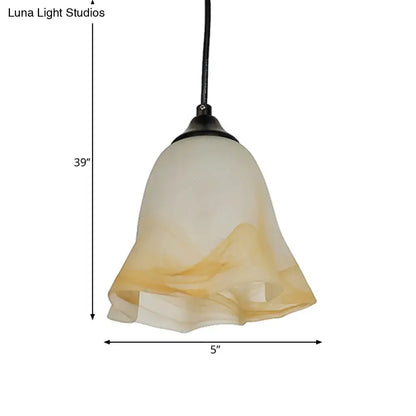 DecorBites traditional glass pendant light with flower cone shape and frosted amber cream shade for living room