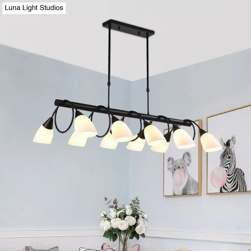Black metal pendant light fixture with multiple off-white milky glass shades by DecorBites traditional collection