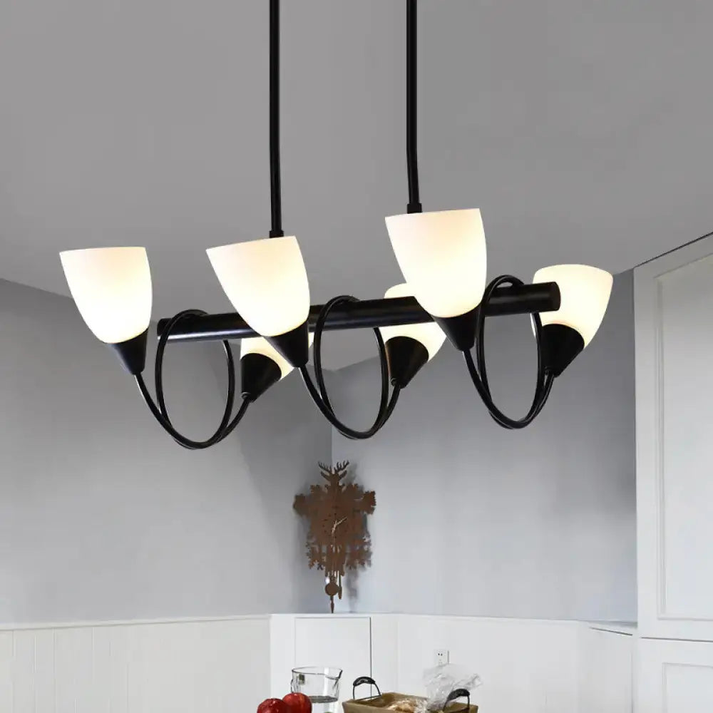 Black metal pendant light fixture with five frosted milky glass shades for traditional indoor lighting
