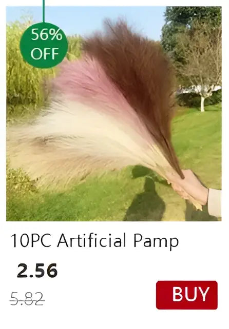 A bundle of 10 artificial pink and creamy white pampas grass plumes in a decorbites transparent nordic vase