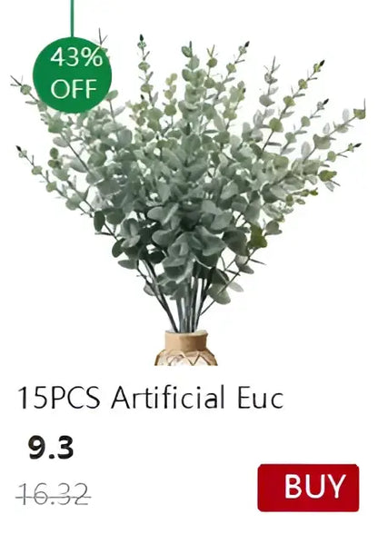 A bundle of 15 artificial eucalyptus branches in green foliage arranged in a woven base with decorbites™ transparent nordic vase