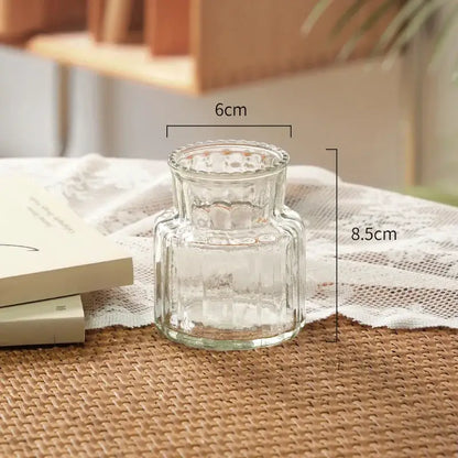 Clear glass decorbites™ transparent nordic vase with faceted textured surface and slightly flared rim for plants and flowers