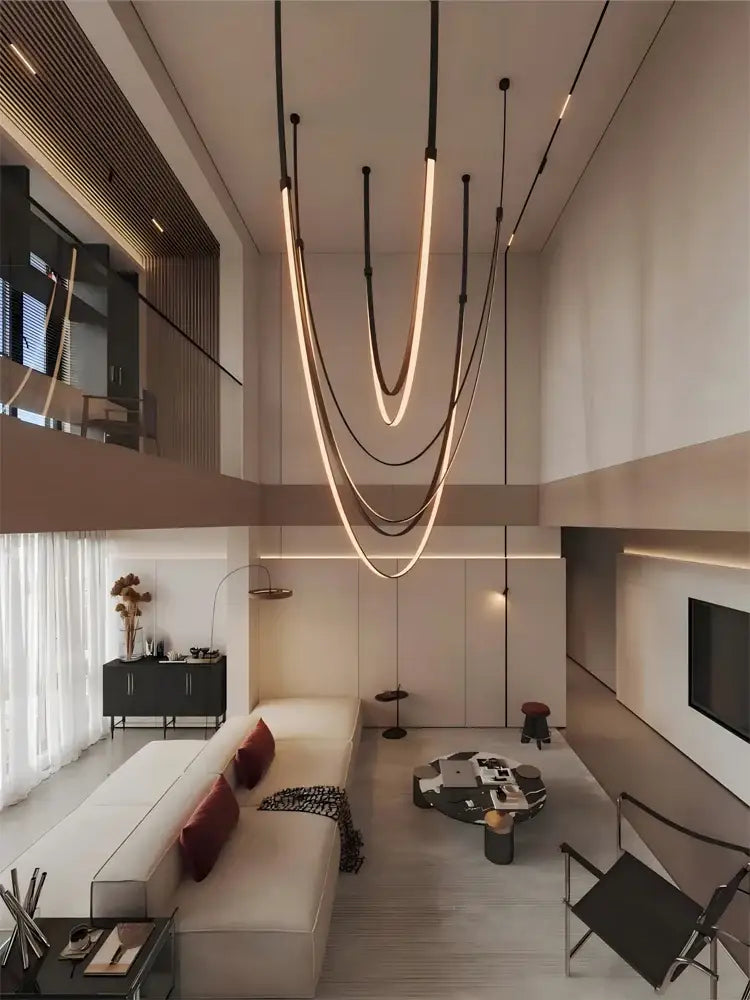 Modern minimalist led chandelier with sleek curved light strips and flexible leather belt accents in warm glow lighting