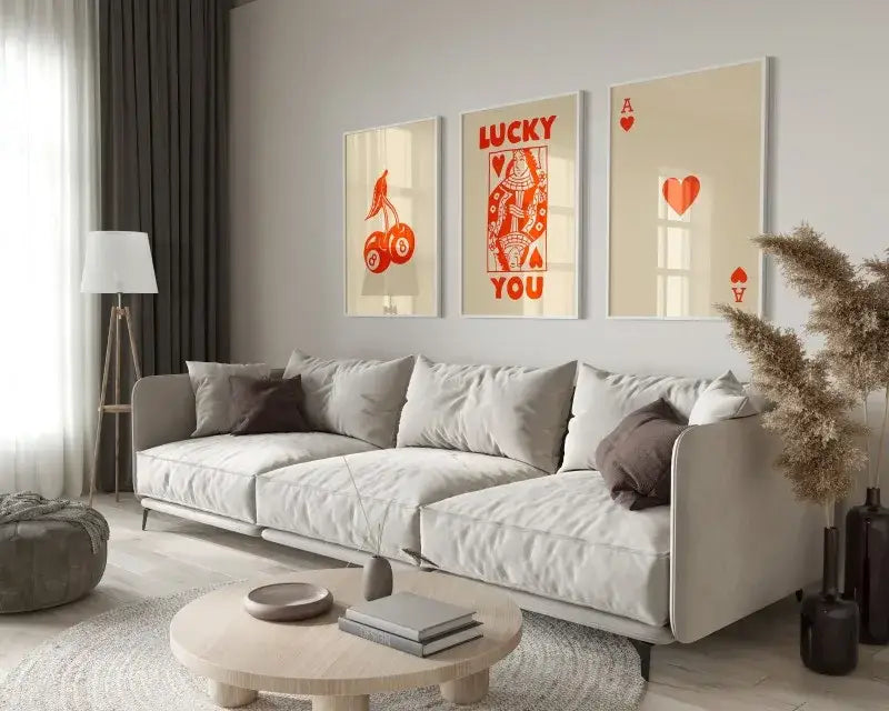 Beige sofa with gray and brown throw pillows beside decorbites trendy retro wall art posters 3-piece set wall art posters