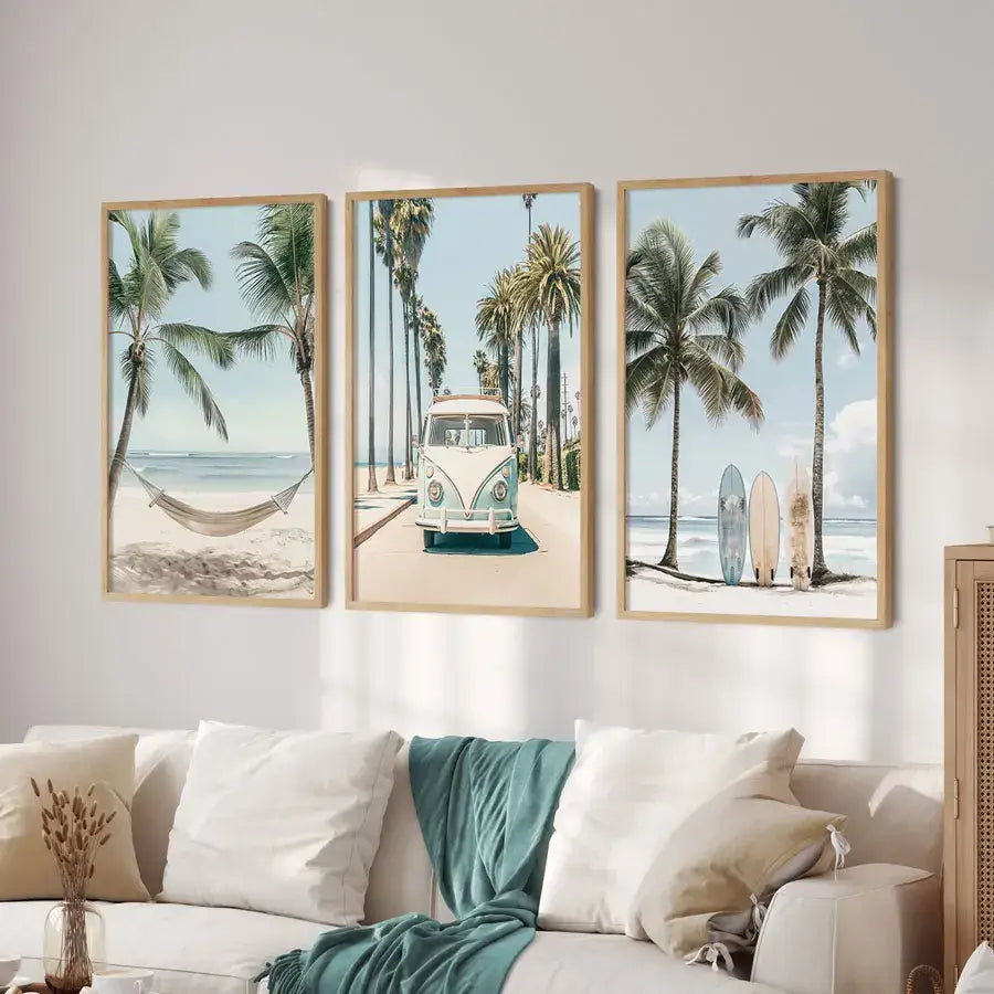 Set of three framed tropical surfboard travel wall art prints with light wood frames for beach-themed decor