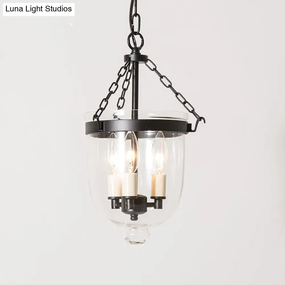 Black metal DecorBites™ pendant chandelier with clear glass inverted cloche and three candle-style bulbs with chain cord length