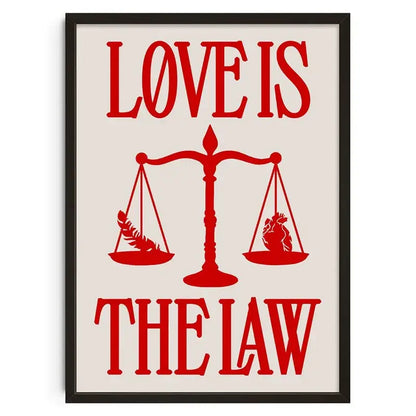 Red framed canvas print featuring bold red love is the law text with an abstract scale design for home decor