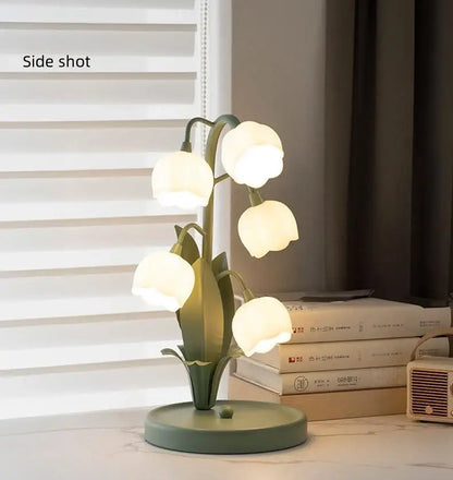 Delicate green vintage floral table lamp with five glowing lily-of-the-valley shaped bulbs for home decor