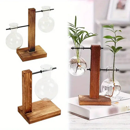 Wooden stand with clear glass two bulb vases and black metal rods for low style desktop plant propagation by decorbites