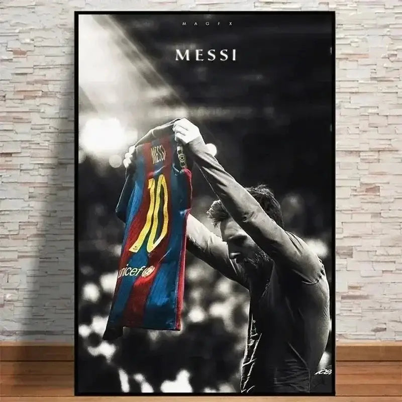 A framed vintage lionel messi canvas print featuring a black and white poster of him holding a blue and red jersey number 10