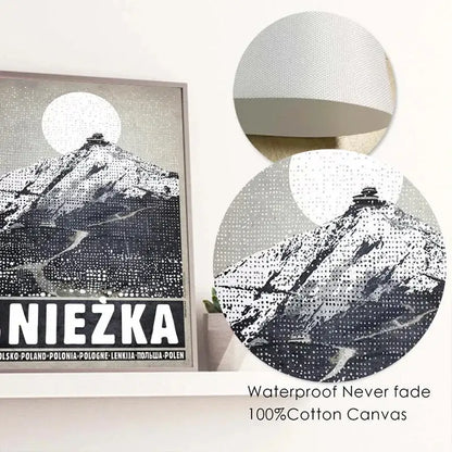 Black and white dotted canvas print of a snowy mountain with a full moon framed in light gray wood vintage poland city posters