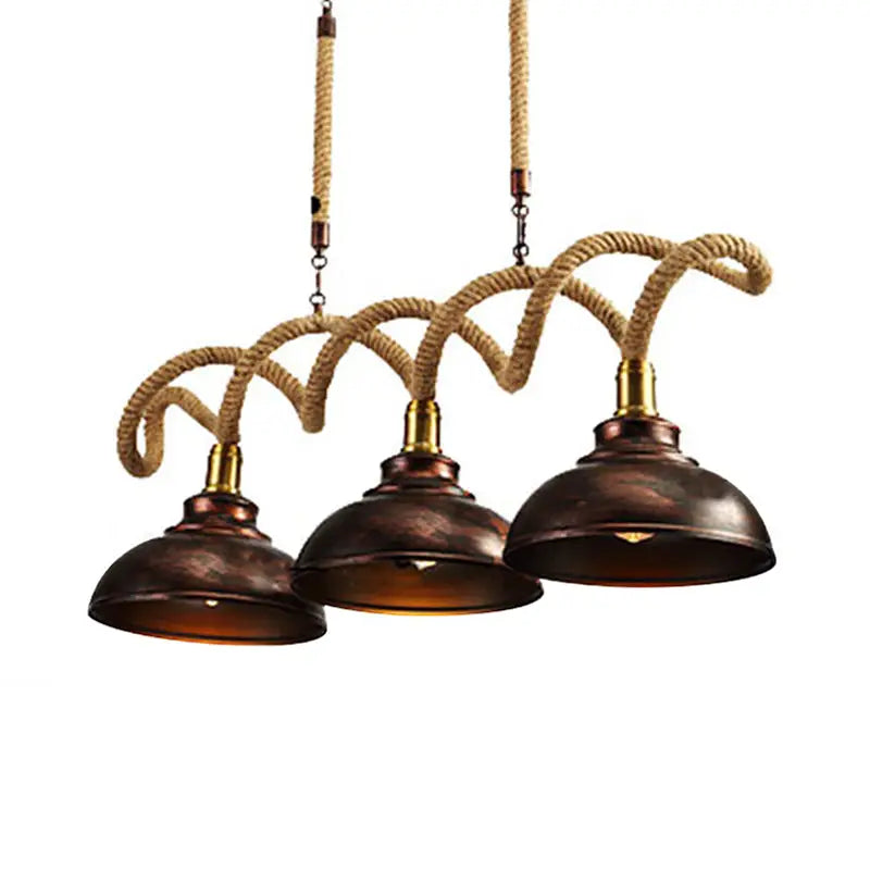 DecorBites vintage rust finish three-light pendant with copper dome shades and natural rope cord suspension