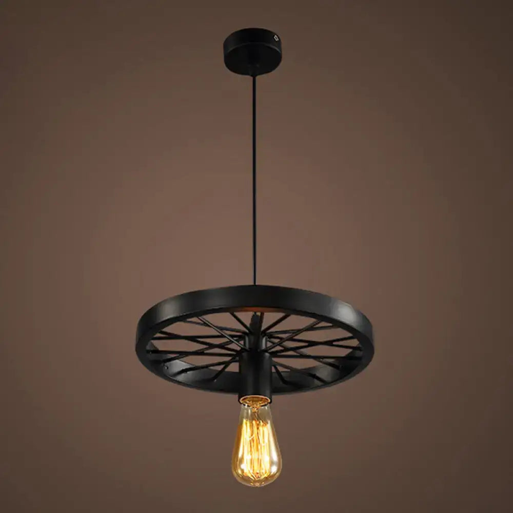 Black metal pendant light with bicycle wheel design and exposed filament bulb featuring vintage style chain cord length
