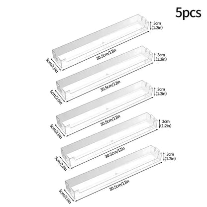 Decorbites™ wall mounted transparent storage rack with clear plastic trays measuring 30.5cm by 3cm by 5cm for organizing small items