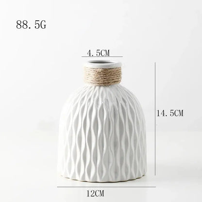 White ceramic DecorBites™ ripple plastic vase with textured wavy surface and natural twine band in modern Nordic style