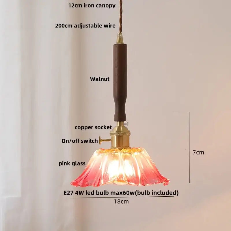 Delicate pink glass pendant light with walnut iron canopy and copper socket paired with vintage white ceramic led kitchen light