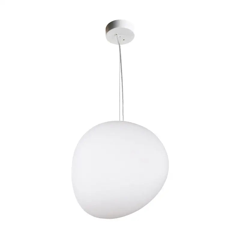 A sleek white glass oval pendant light with smooth rounded globe and slender metallic chain for ceiling mounting