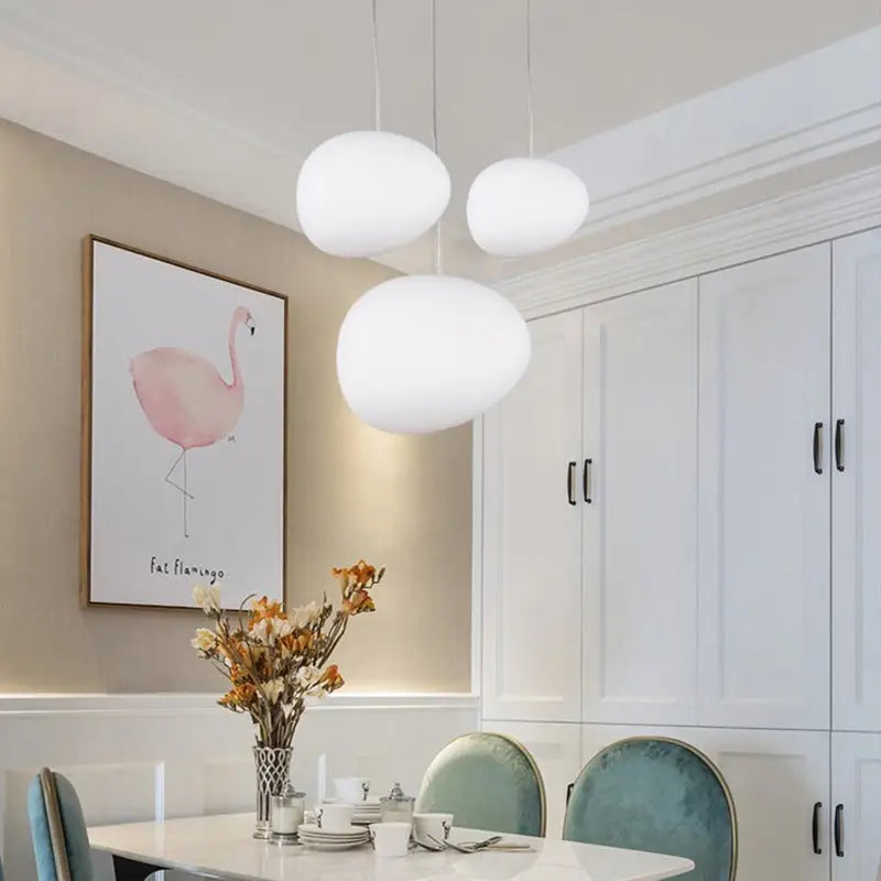 Three white glass oval pendant lights hanging from ceiling in simple style decorbites glass oval ceiling fixture