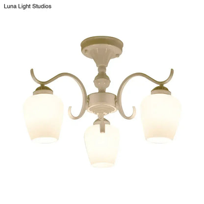 Decorbites™ cream-colored chandelier with three curved arms and frosted opaline glass cone shades for semi flush ceiling use