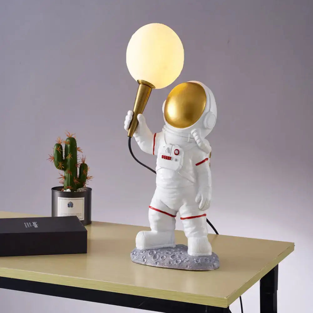 DecorBites white resin spaceman table lamp with gold helmet holding glowing light fixture 220v-240v led incandescent fluorescent