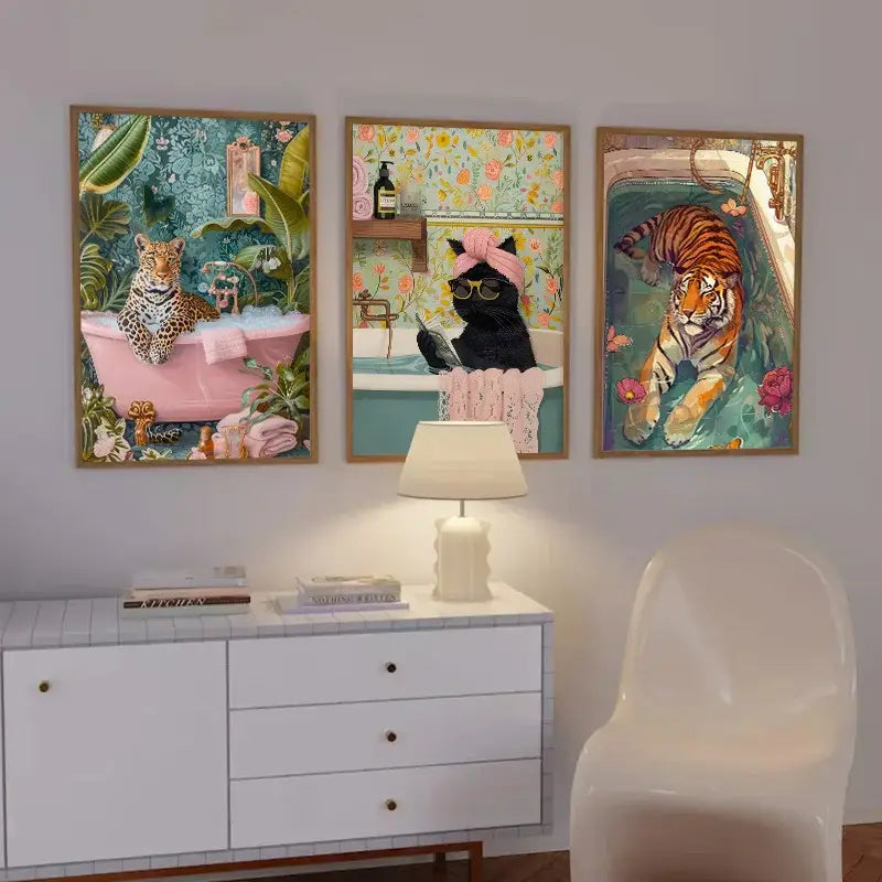 Three framed vibrant wildlife bathtub animal canvas artworks featuring anthropomorphic cats with floral backgrounds