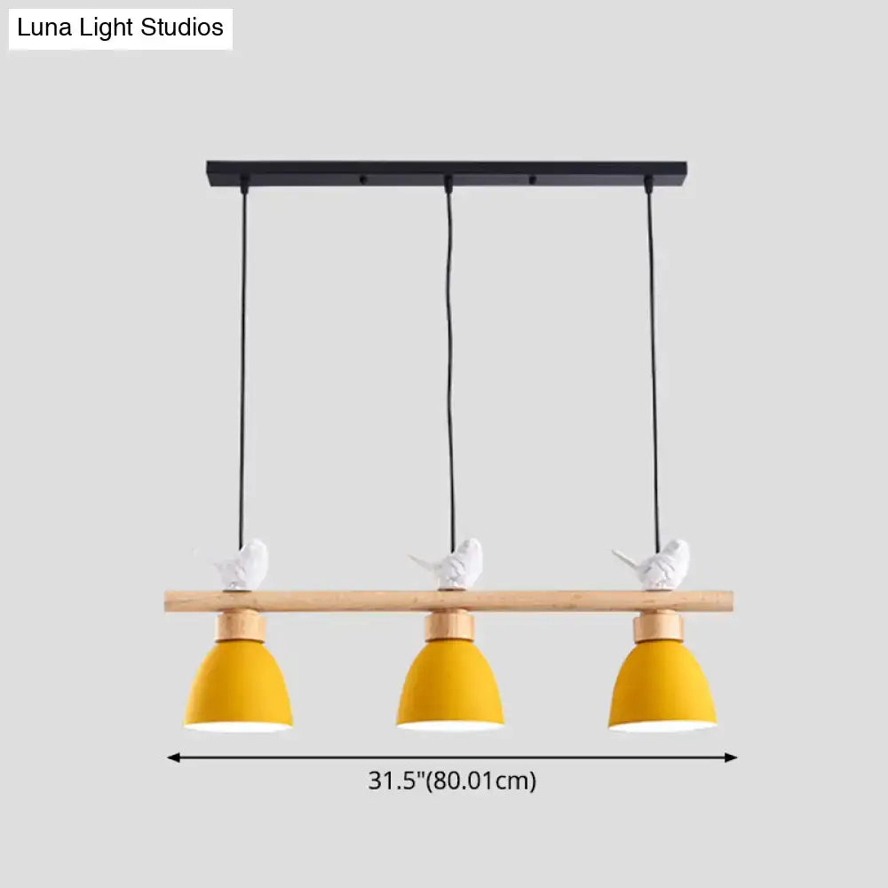 Yellow ceramic macaron bowl pendant light with white bird figurines on wooden bar for e26 e27 sockets
