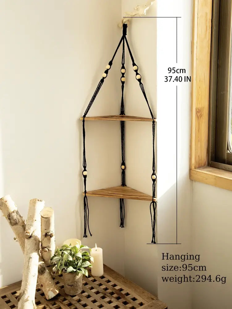 DecorBites wooden corner shelf with black macrame, light wood triangular shelves, and wooden beads in boho style