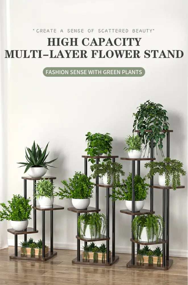 Dark brown metal multi-layer wooden flower plant stand with wooden shelves holding white ceramic pots with green plants