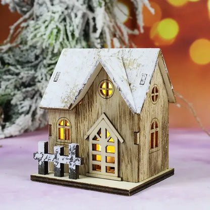 DecorBites wooden led light house Christmas decoration with weathered white roof and warm glowing yellow lights