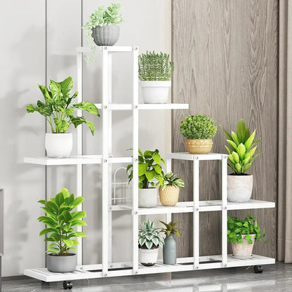 White wrought iron plant stand with multiple shelves and wheels by decorbites for versatile plant display