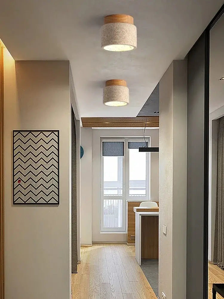 Two cylindrical ceiling lights with beige fabric shades and wood tops from decorbites yellow marble ceiling light collection